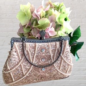 Beautiful blush embellished evening bag. Used once